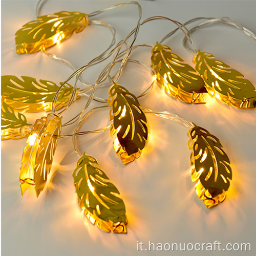 Lampade in ferro da ragazza con luci di fascia alta con foglie d&#39;oro vuote